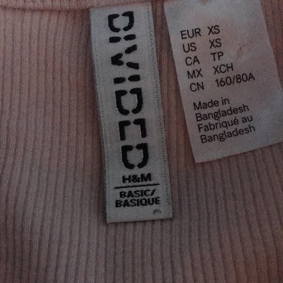 Salmon coloured shirt from H&M lightly used. 100% recycled. - Picture 2 of 3